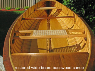 restored wide board canoe